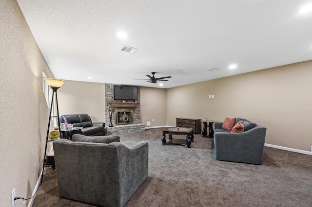 20407 Spoonwood Dr, Humble, TX 77346 - carpeted living room with a ceiling fan, a fireplace, recessed lighting, and baseboards