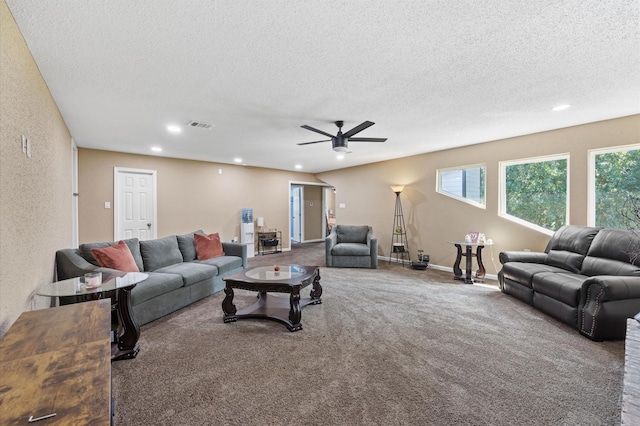 20407 Spoonwood Dr, Humble, TX 77346 - carpeted living area featuring recessed lighting, a textured ceiling, a ceiling fan, and healthy amount of natural light