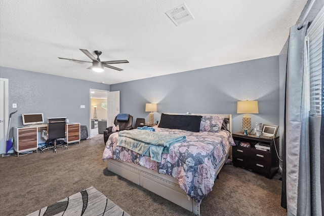 20407 Spoonwood Dr, Humble, TX 77346 - carpeted bedroom featuring an office area, a textured ceiling, a textured wall, and a ceiling fan
