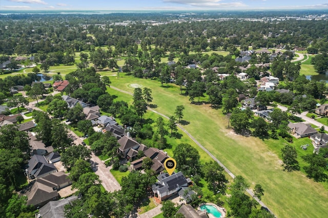 20407 Spoonwood Dr, Humble, TX 77346 - aerial view of property's location featuring nearby suburban area, a golf club, and a large body of water