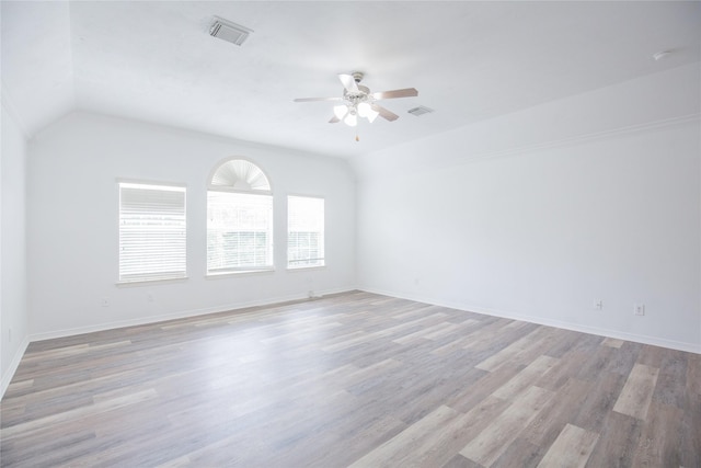5413 Kiam St Unit B, Houston, TX 77007 - unfurnished room with ceiling fan, lofted ceiling, light wood finished floors, and baseboards
