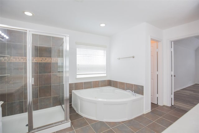 5413 Kiam St Unit B, Houston, TX 77007 - bathroom featuring a bath, a stall shower, tile patterned floors, and recessed lighting