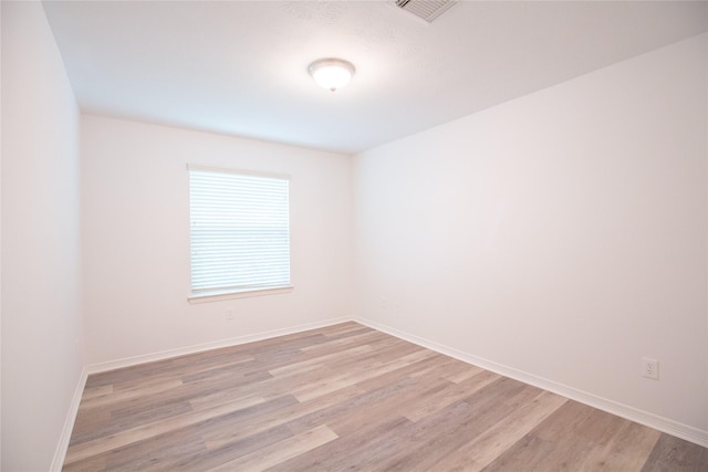 5413 Kiam St Unit B, Houston, TX 77007 - unfurnished room with light wood-style floors and baseboards