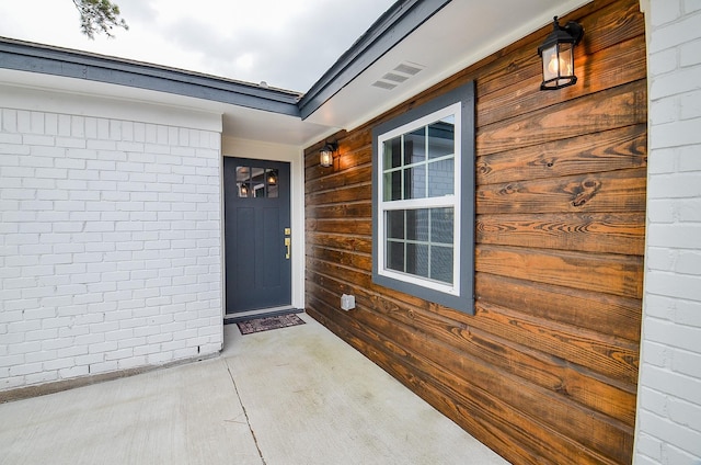 14934 Arundel Dr, Channelview, TX 77530 - view of exterior entry featuring brick siding