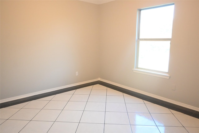 12002 Cobbs Creek Ct, Houston, TX 77067 - tiled empty room with baseboards
