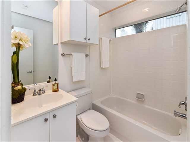 1508 Cleveland St, Houston, TX 77019 - full bathroom featuring toilet, vanity, and tub / shower combination