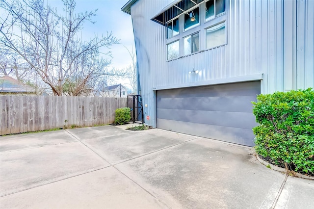 1508 Cleveland St, Houston, TX 77019 - view of property exterior featuring a garage and driveway