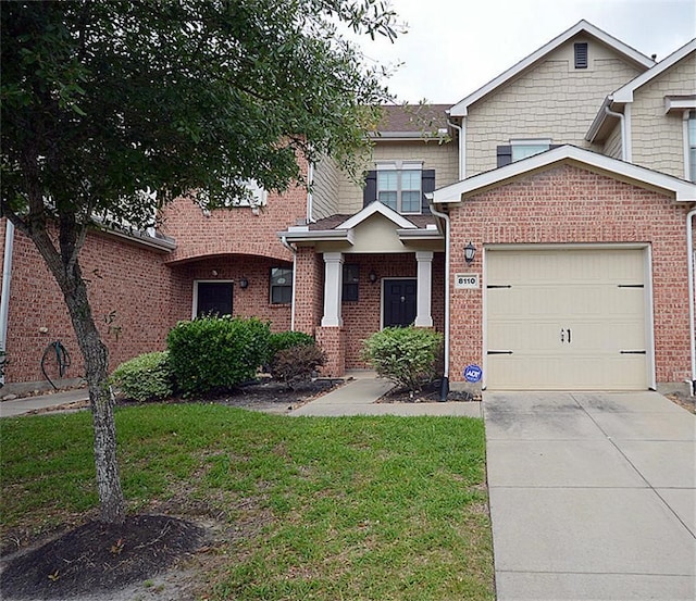8110 Singing Sonnet Ln, Houston, TX 77072 - view of front of property with a garage, driveway, brick siding, and a front lawn