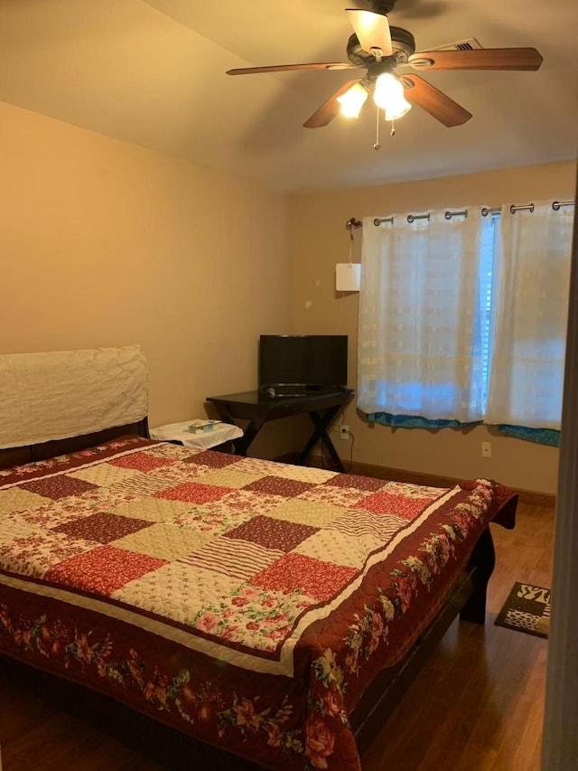 8110 Singing Sonnet Ln, Houston, TX 77072 - bedroom with wood finished floors and ceiling fan