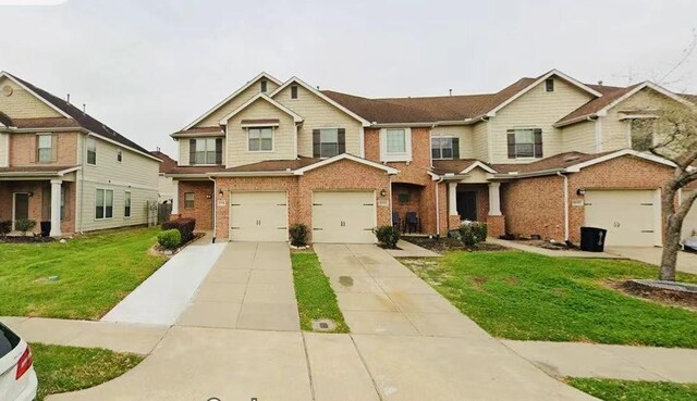 8110 Singing Sonnet Ln, Houston, TX 77072 - view of front facade featuring brick siding, concrete driveway, a front yard, and an attached garage