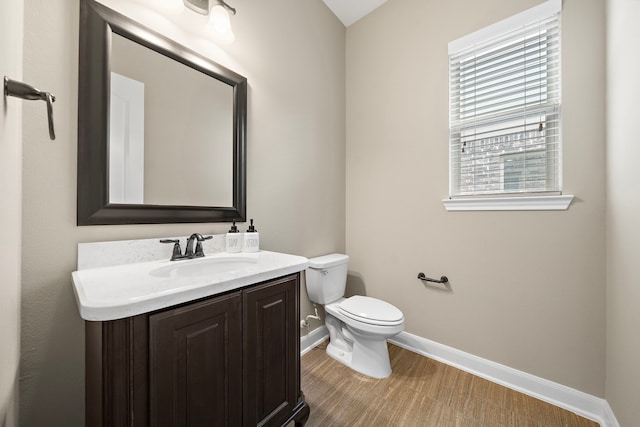 2506 Haven Hill Dr, Katy, TX 77494 - half bath with baseboards, vanity, and toilet