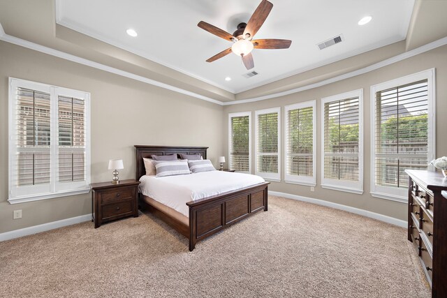 2506 Haven Hill Dr, Katy, TX 77494 - bedroom with crown molding, a tray ceiling, light colored carpet, multiple windows, and recessed lighting
