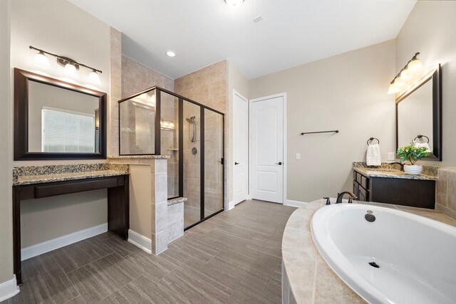 2506 Haven Hill Dr, Katy, TX 77494 - full bathroom with a garden tub, a stall shower, vanity, and baseboards