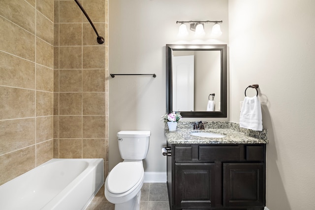 2506 Haven Hill Dr, Katy, TX 77494 - bathroom with vanity, toilet, baseboards, washtub / shower combination, and tile patterned floors