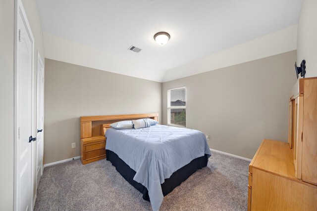 2506 Haven Hill Dr, Katy, TX 77494 - bedroom with light carpet, baseboards, and vaulted ceiling