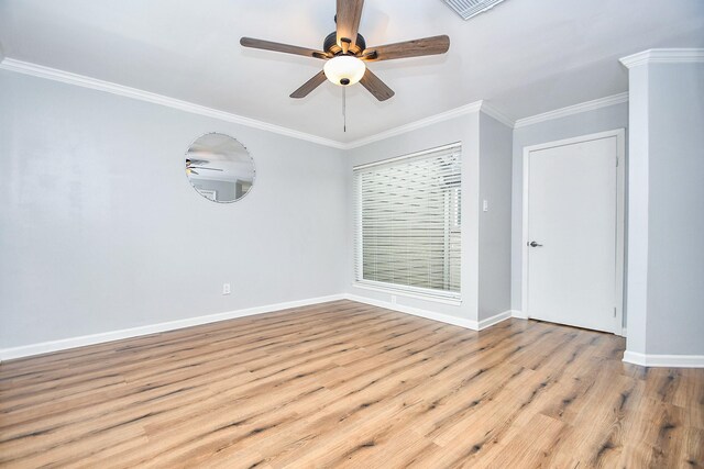 1908 Augusta Dr Unit 10, Houston, TX 77057 - empty room with ceiling fan, wood finished floors, baseboards, and ornamental molding