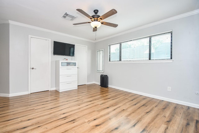 1908 Augusta Dr Unit 10, Houston, TX 77057 - unfurnished bedroom featuring light wood finished floors, crown molding, baseboards, and ceiling fan