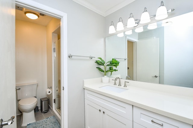 1908 Augusta Dr Unit 10, Houston, TX 77057 - bathroom featuring toilet, vanity, a shower stall, tile patterned flooring, and ornamental molding
