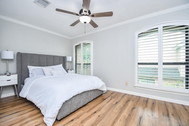 1908 Augusta Dr Unit 10, Houston, TX 77057 - bedroom with wood finished floors, baseboards, crown molding, and ceiling fan