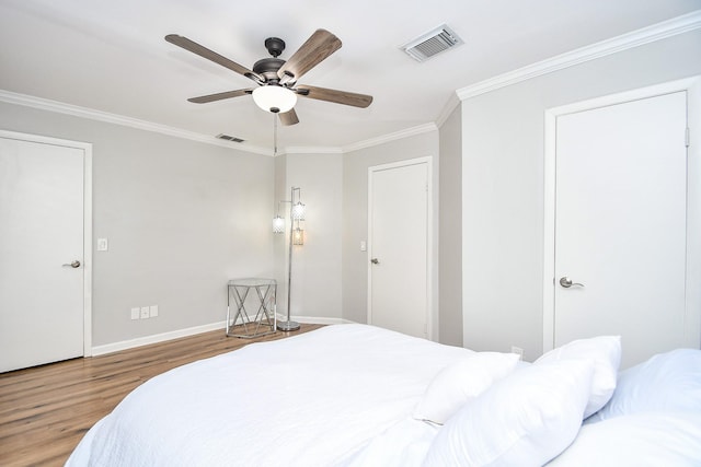 1908 Augusta Dr Unit 10, Houston, TX 77057 - bedroom featuring wood finished floors, crown molding, baseboards, and a ceiling fan