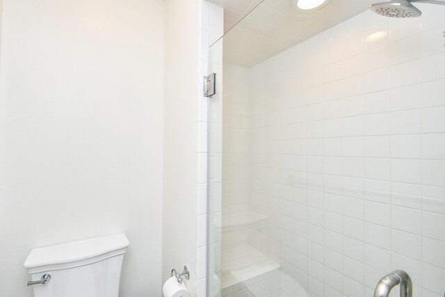 1908 Augusta Dr Unit 10, Houston, TX 77057 - bathroom with tiled shower and toilet