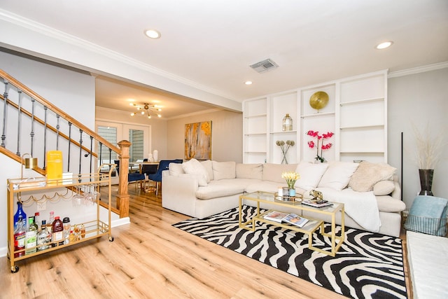 1908 Augusta Dr Unit 10, Houston, TX 77057 - living room featuring wood finished floors, ornamental molding, stairway, recessed lighting, and baseboards