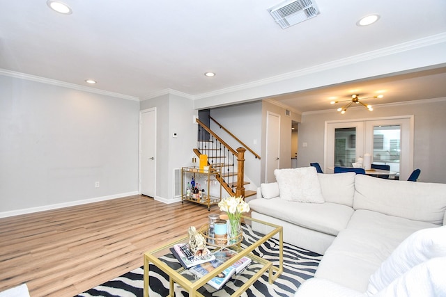 1908 Augusta Dr Unit 10, Houston, TX 77057 - living room featuring stairway, wood finished floors, baseboards, recessed lighting, and ornamental molding