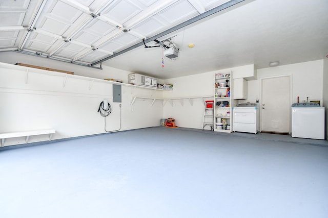 1908 Augusta Dr Unit 10, Houston, TX 77057 - garage with separate washer and dryer, electric panel, and a garage door opener