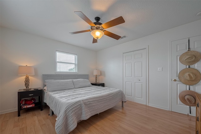 22023 Deaf P Smith Dr, Galveston, TX 77554 - bedroom featuring light wood finished floors and a ceiling fan