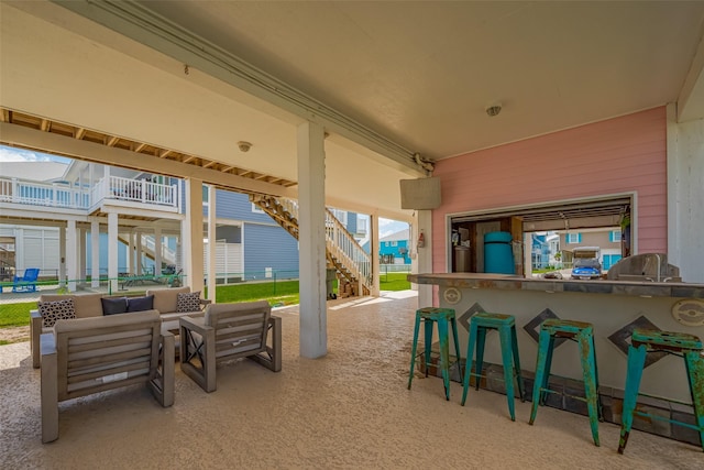 22023 Deaf P Smith Dr, Galveston, TX 77554 - view of patio with stairway
