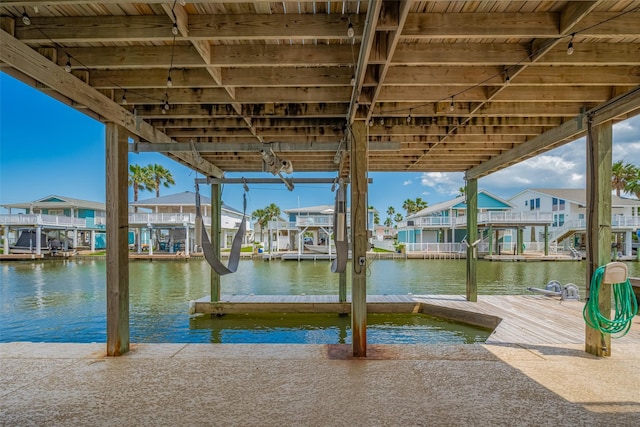 22023 Deaf P Smith Dr, Galveston, TX 77554 - dock area with a residential view and a water view