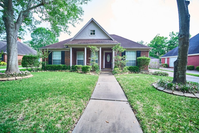 5022 Moss Run Dr, Missouri City, TX 77459 - view of front of home with brick siding and a front lawn