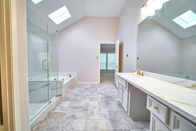 5022 Moss Run Dr, Missouri City, TX 77459 - full bathroom with a skylight, a bath, a stall shower, vanity, and high vaulted ceiling