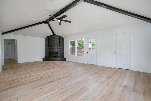 29302 Raestone St, Spring, TX 77386 - unfurnished living room with a ceiling fan, wood finished floors, baseboards, and a fireplace