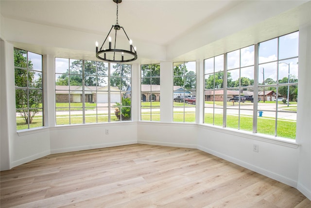 29302 Raestone St, Spring, TX 77386 - unfurnished sunroom with a chandelier, healthy amount of natural light, and baseboards