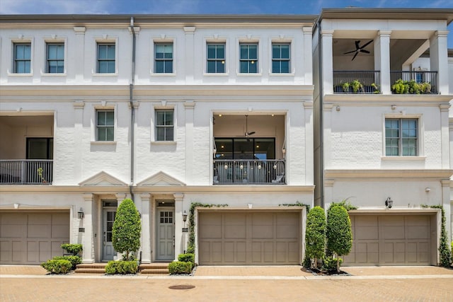 6110 Nicholas Grove Pl, Houston, TX 77055 - townhome / multi-family property featuring a balcony and an attached garage