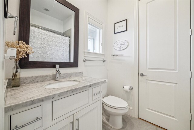 6110 Nicholas Grove Pl, Houston, TX 77055 - bathroom featuring vanity, toilet, and tile patterned flooring