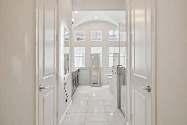 6110 Nicholas Grove Pl, Houston, TX 77055 - full bathroom featuring tile patterned flooring, recessed lighting, baseboards, and a shower with shower door