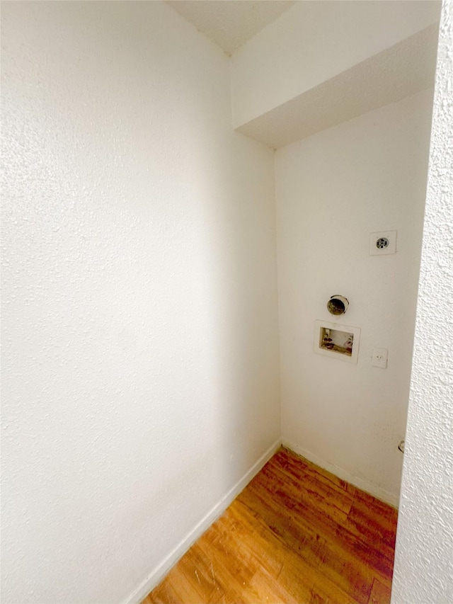 12615 Brookglade Cir Unit 309, Houston, TX 77099 - laundry area with hookup for an electric dryer, washer hookup, and light wood-style floors