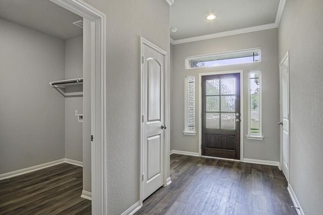 1290 Rd 66112, Dayton, TX 77535 - foyer entrance featuring dark wood finished floors, crown molding, baseboards, and recessed lighting