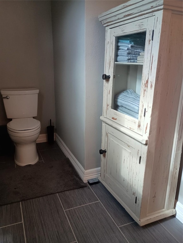 41 Lakeview Shores Dr, Coldspring, TX 77331 - bathroom with toilet and baseboards