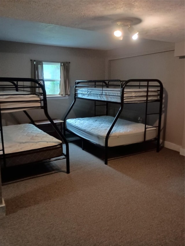 41 Lakeview Shores Dr, Coldspring, TX 77331 - carpeted bedroom featuring a textured ceiling