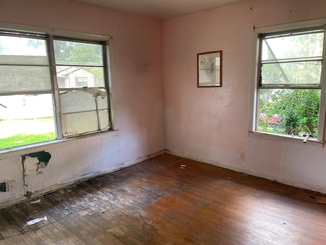 3706 Yosemite St, Houston, TX 77021 - empty room with hardwood / wood-style floors and plenty of natural light
