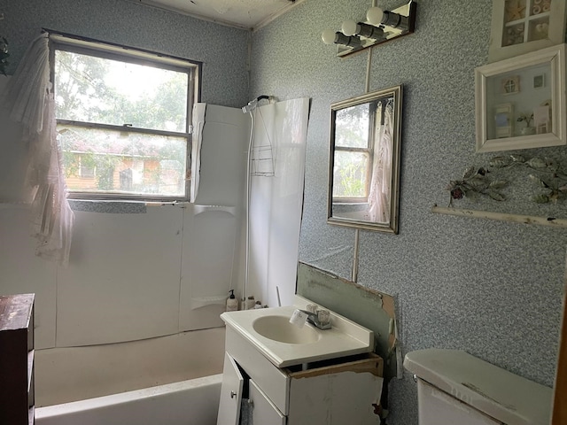 3706 Yosemite St, Houston, TX 77021 - full bathroom with vanity, toilet, healthy amount of natural light, and bathing tub / shower combination