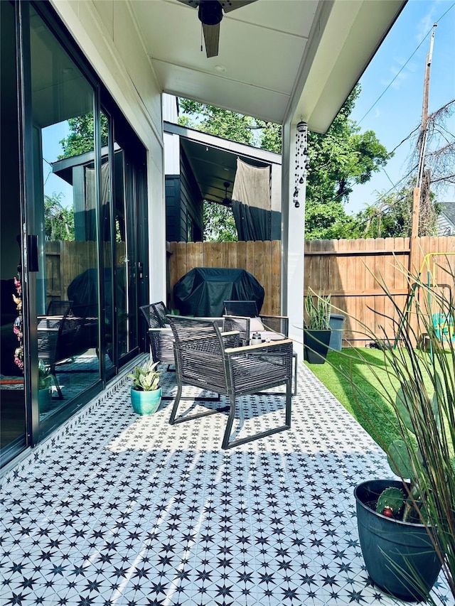 210 E 39th St, Houston, TX 77018 - view of patio featuring ceiling fan