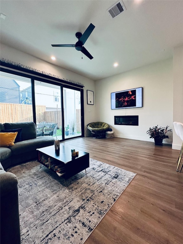 210 E 39th St, Houston, TX 77018 - living area featuring wood finished floors, recessed lighting, baseboards, and a ceiling fan
