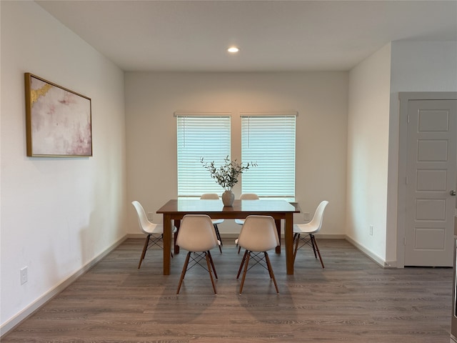 12545 Walmgate Ct, Houston, TX 77047 - dining area with recessed lighting, wood finished floors, and baseboards