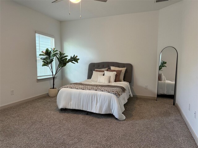 12545 Walmgate Ct, Houston, TX 77047 - bedroom featuring carpet flooring, ceiling fan, and baseboards