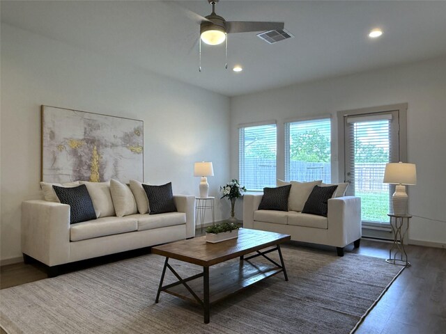 12545 Walmgate Ct, Houston, TX 77047 - living room featuring healthy amount of natural light, wood finished floors, a ceiling fan, recessed lighting, and baseboards