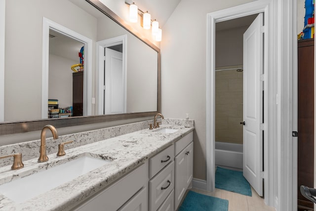 28911 Ally Lynn Way, Katy, TX 77494 - bathroom featuring double vanity and tile patterned flooring